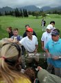 Obama greets supporters after playing a round of golf at the Mid Pacific Country Club in Kailua, Hawaii, Wednesday,